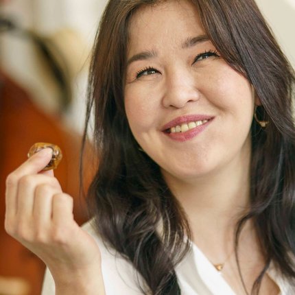 woman eats a fresh date